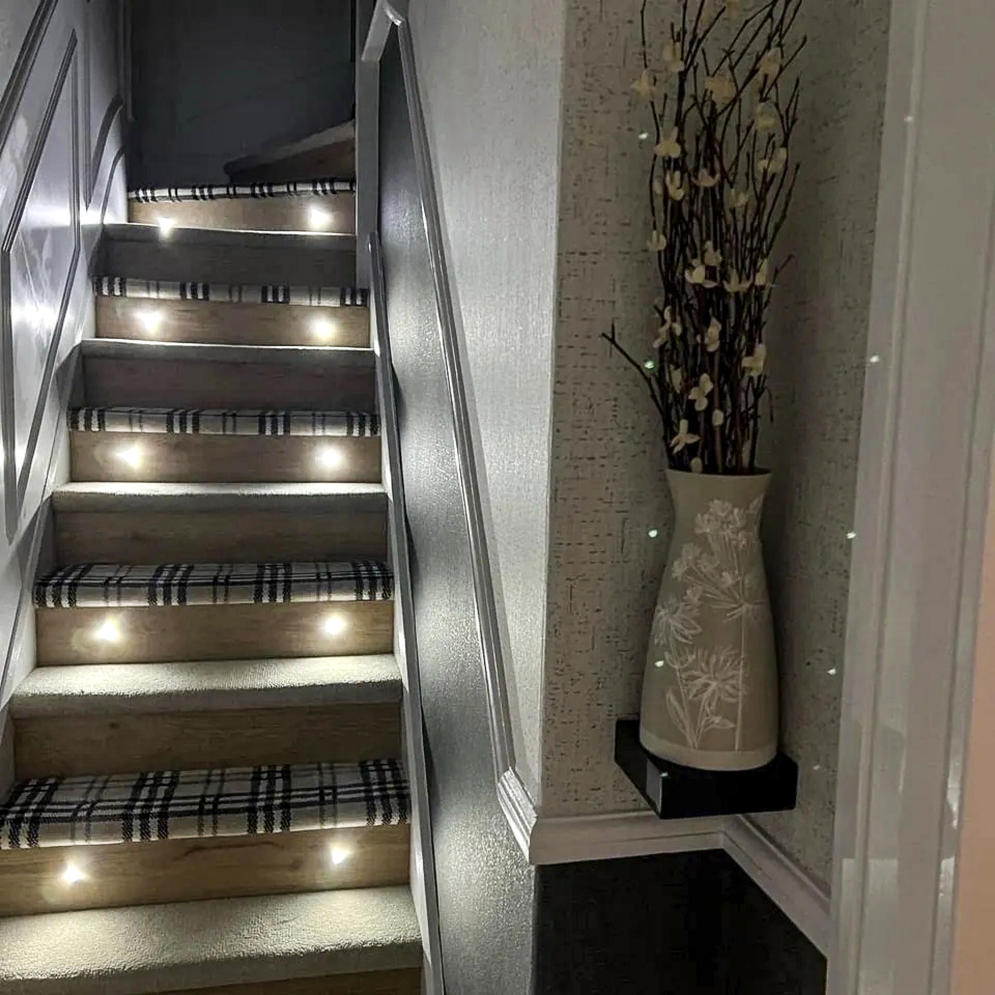 Home Well lit staircase in a domestic property. Each stair has two white LEDs.